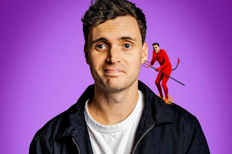 Luke Kidgell with a little version of himself dressed as a devil on his shoulder