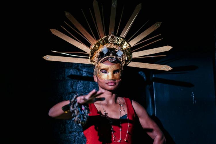 performer wearing a head piece